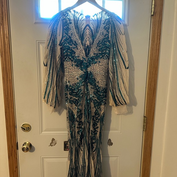Elegant Sheer Illusion Gown with Teal Sequin Accents - Picture 8 of 11